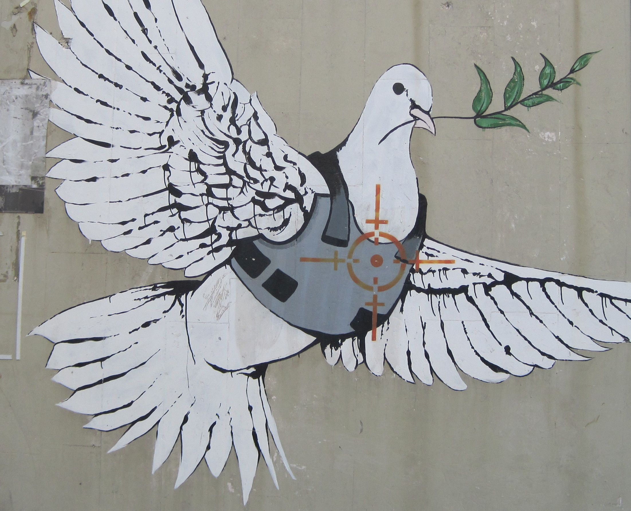 Bildnachweis: Banksy (zugeschrieben), „Friedenstaube in Bethlehem“, 2007, Foto: Klaus Steinbüchl. 